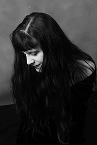 Stefanie Renee Goldstein - humbly looking down and to the left side